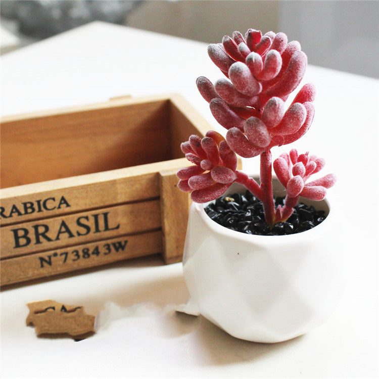 Custom Pc Build 2025 with vibrant artificial succulent bonsai ornament in stylish white pot.